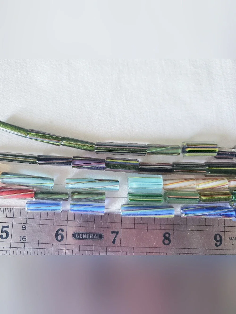 80 hand-drawn glass tube beads